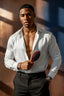 Man holding a red hairbrush wearing a white shirt and black pants.