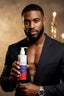 Man holding a bottle of hair care product against a warm-toned background