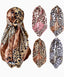 Set of leopard print scarves in various styles on a white background