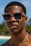 Man wearing sunglasses with a blurred beach background