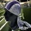 Mannequin head wearing a purple and gray headscarf with 'Ski Styles' branding on a sports field background.