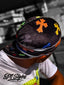 Designer black velvet durag showcasing vibrant cross patterns, perfect for enhancing wave patterns with flair.​